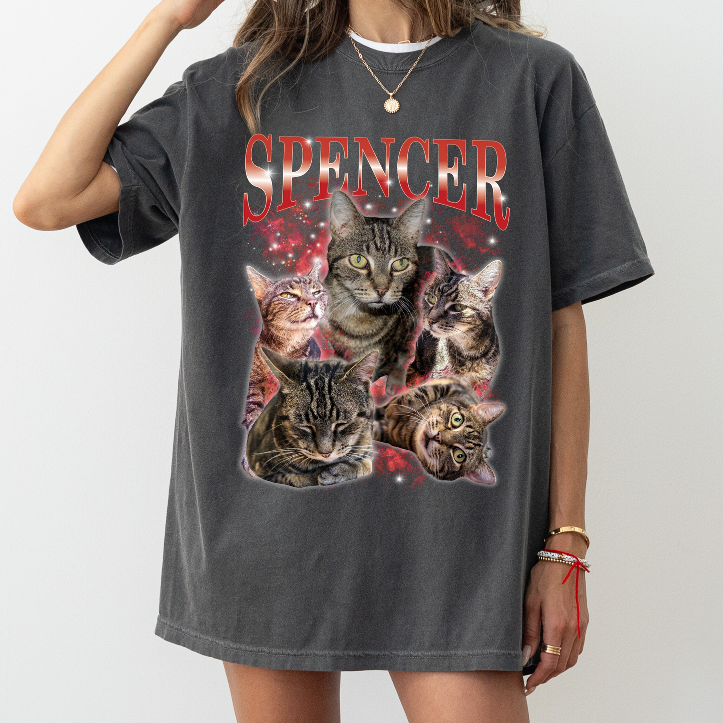 a woman wearing a t - shirt with cats on it