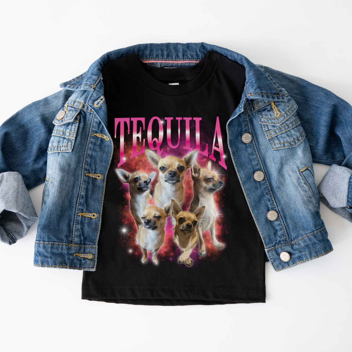 a black shirt with a picture of three dogs on it