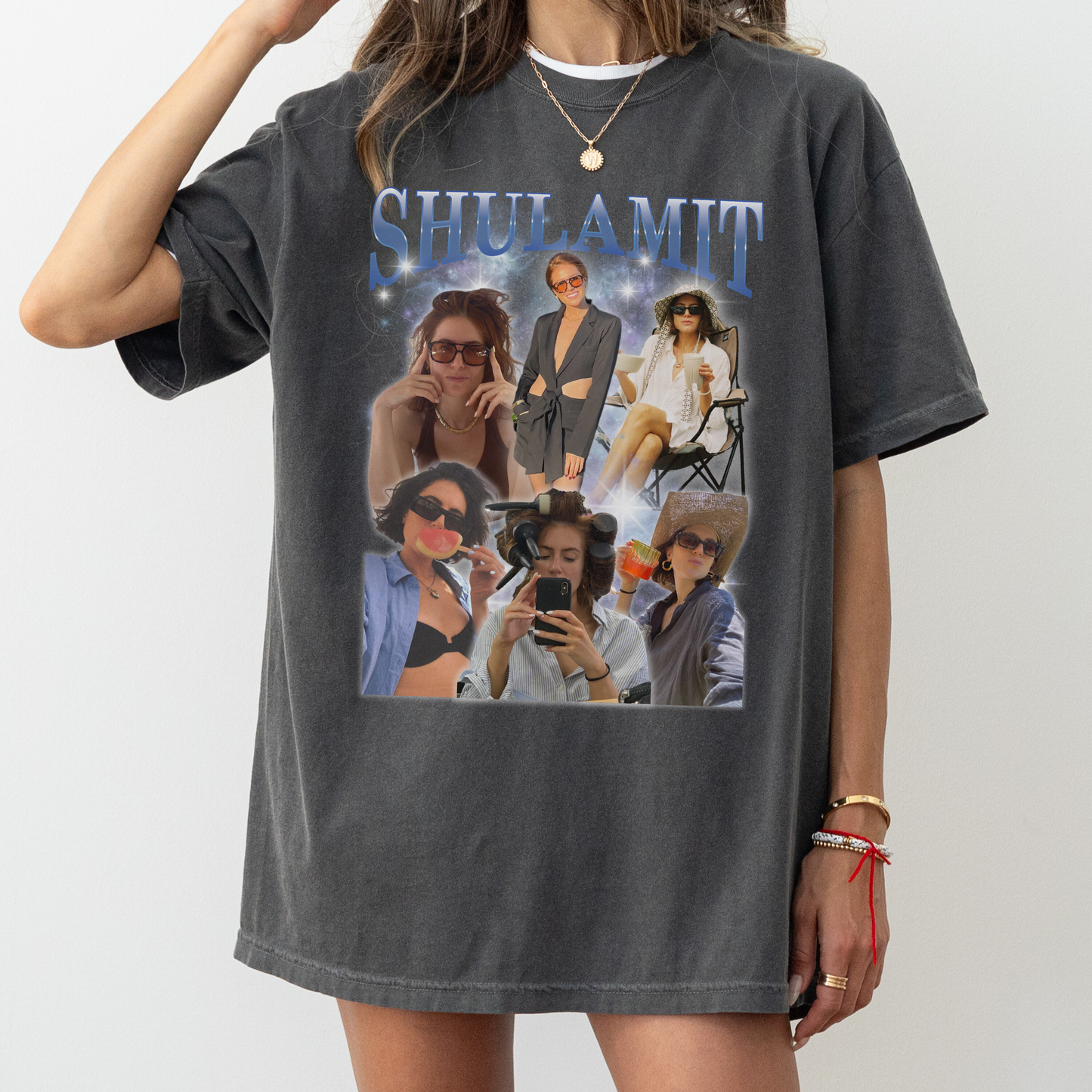 a woman wearing a shirt with a picture of people on it