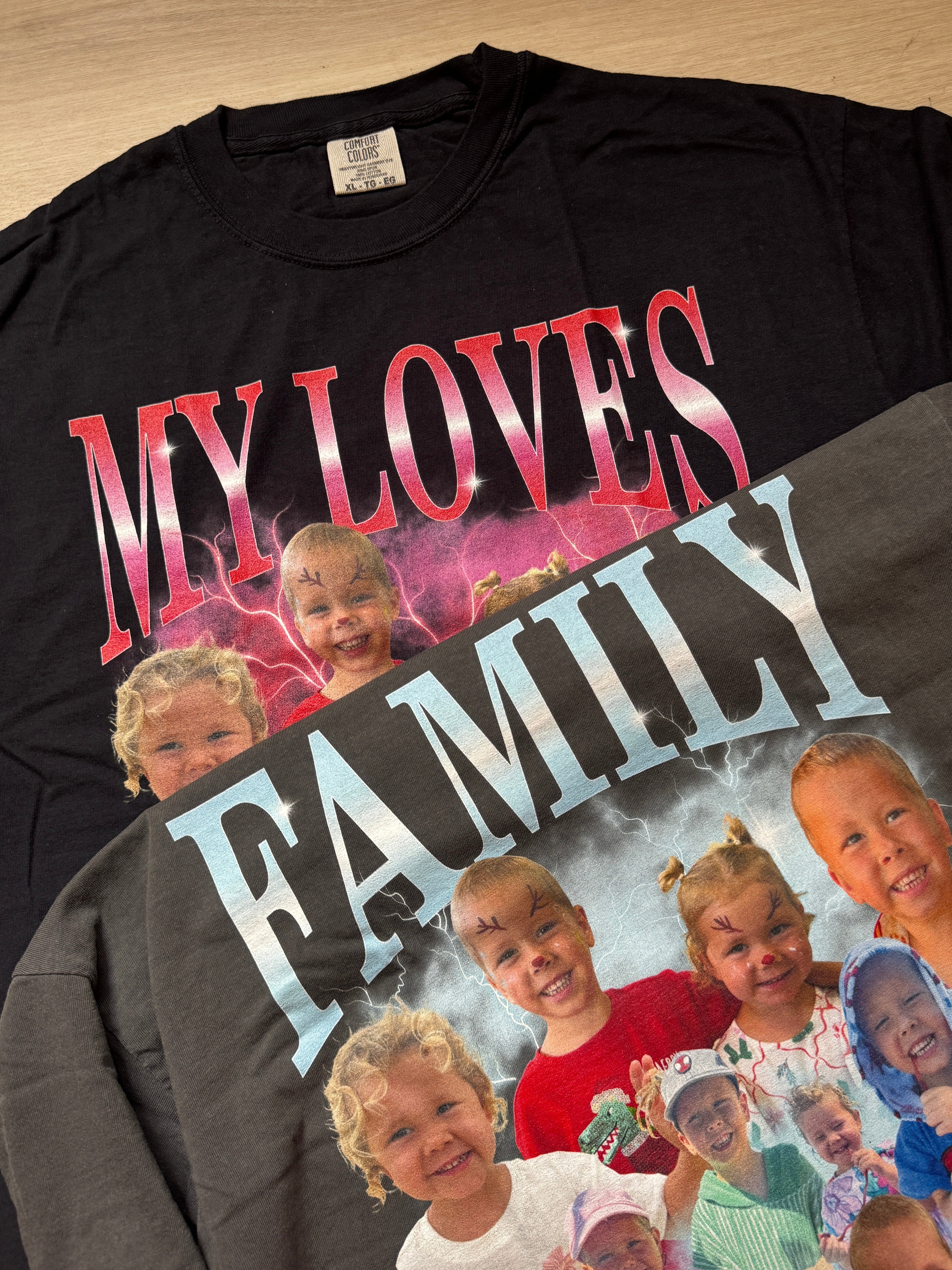 Black t-shirt with 'MY LOVES FAMILY' text and images of children on a white background