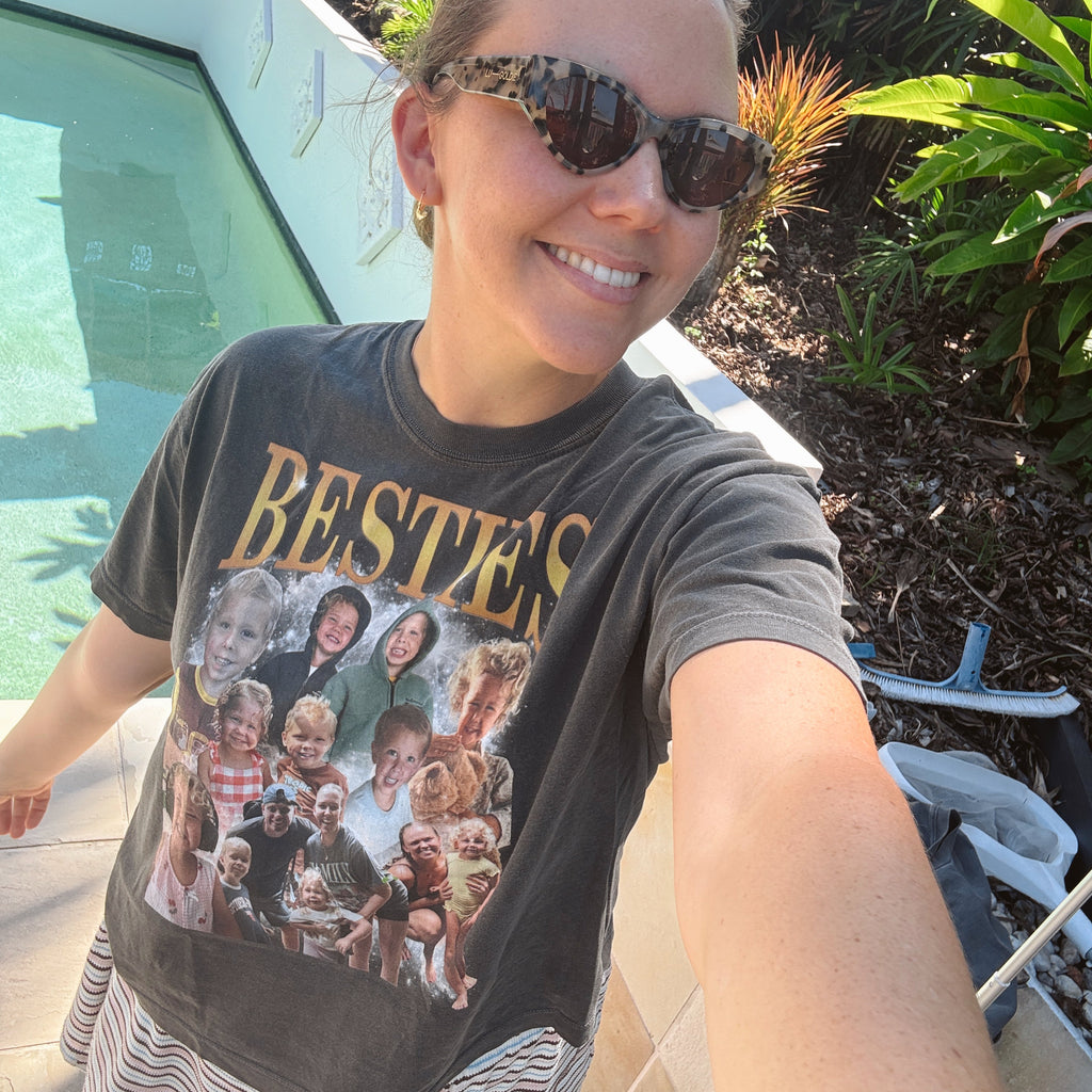 Person wearing a t-shirt with a graphic design outdoors