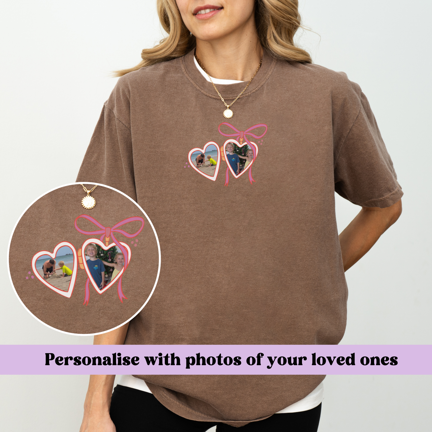 a woman wearing a brown t - shirt with pink hearts on it