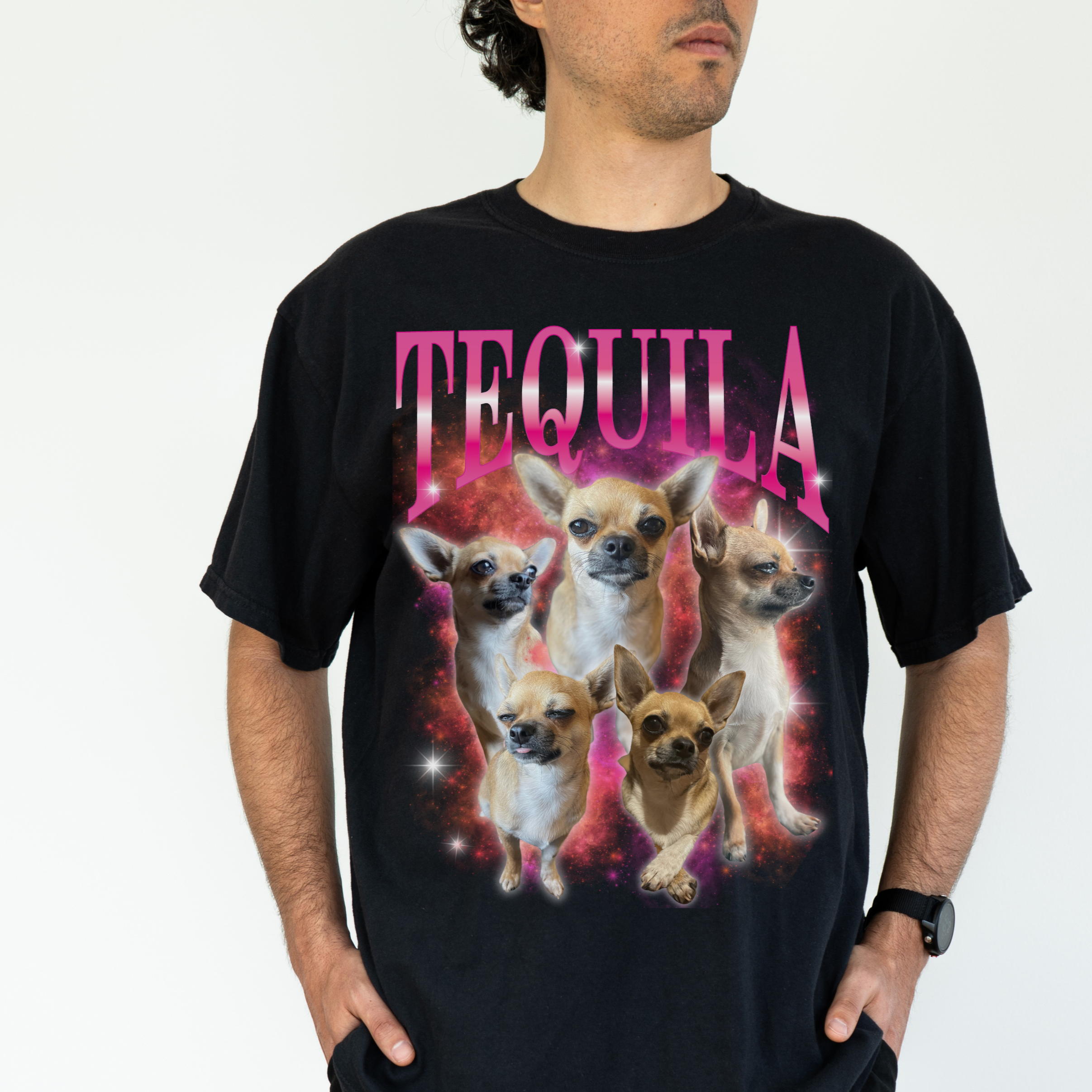 a man standing in front of a white wall wearing a custom black t - shirt with photos of his dog