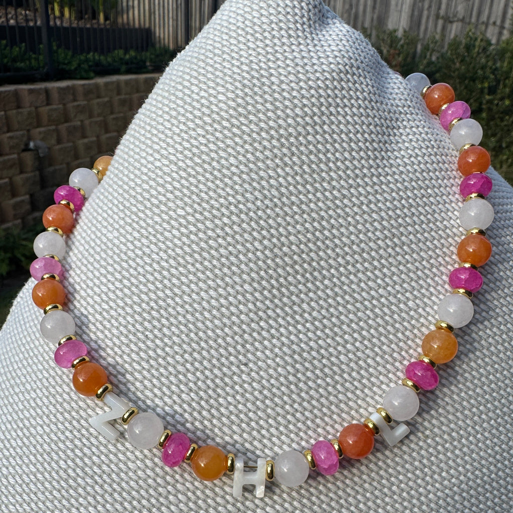 Multicolored beaded bracelet on a textured surface